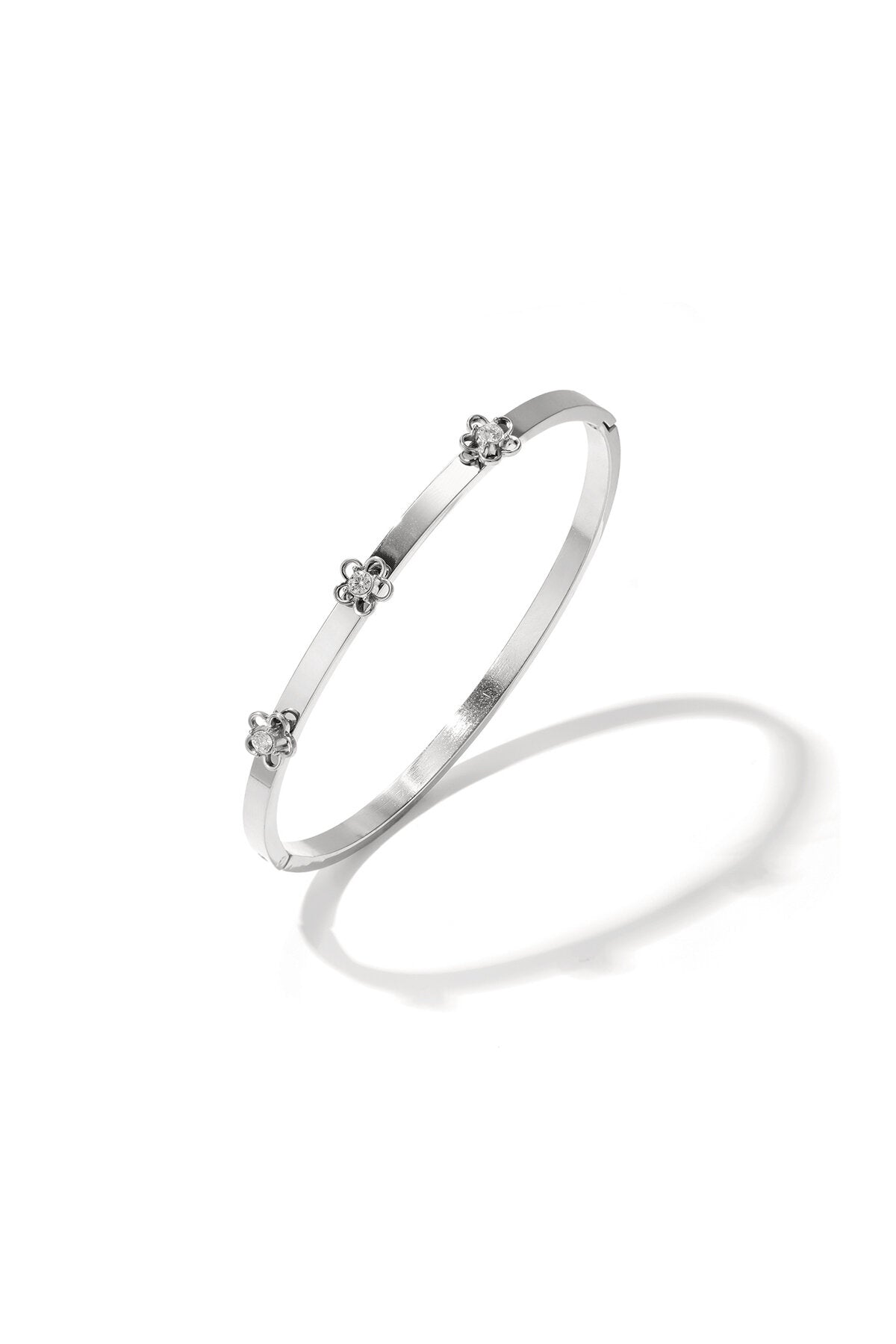 Bangle with floral detail and rhinestone