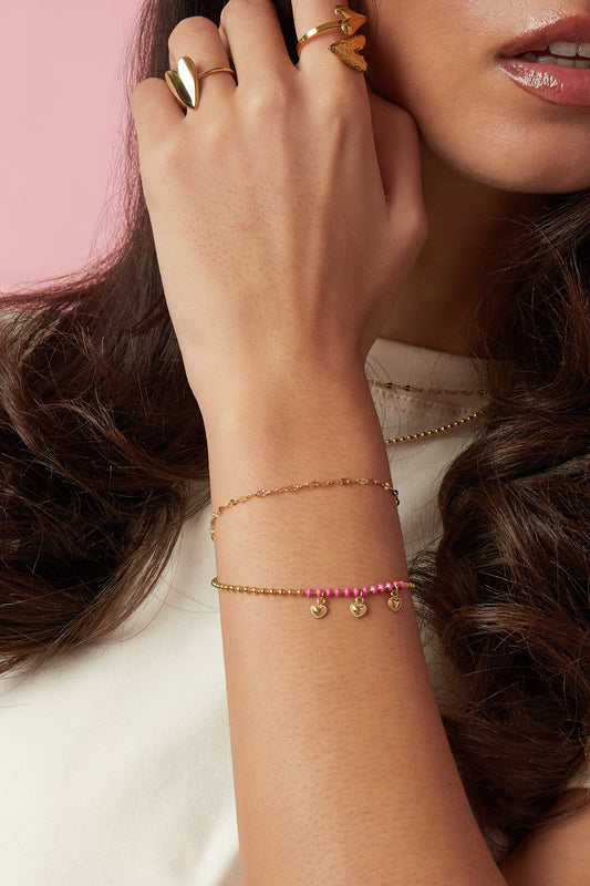 Double bracelet with beads and heart charms