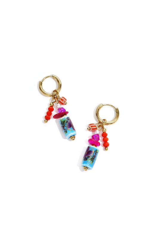 Earrings with dangling beads and a floral print