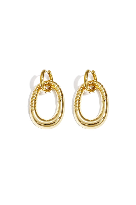 Statement earrings with detailed oval pendant