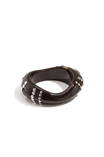 Resin bangle bracelet with studs in a striped pattern