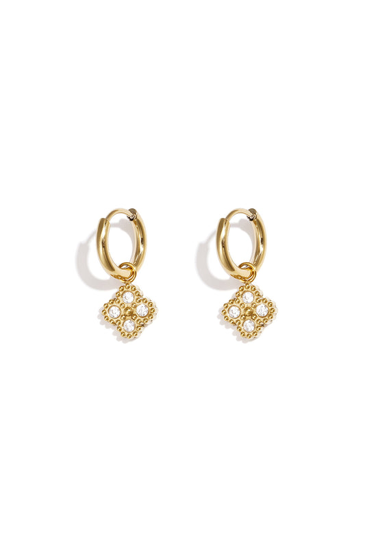 Small hoop earrings with zirconia-set clover charm