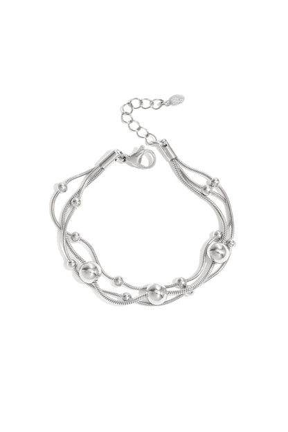 Bracelet with chains and polka dots