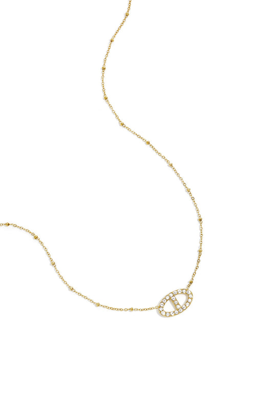 Necklace with decorated oval pendant