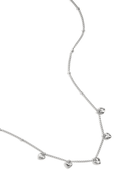 Minimalist necklace with small hearts