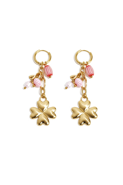 Small hoop earrings with hanging clover, beads and leaves