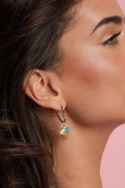 Heart-shaped hoop earrings with charms