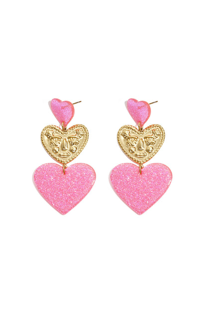 Statement earrings with glitter hearts
