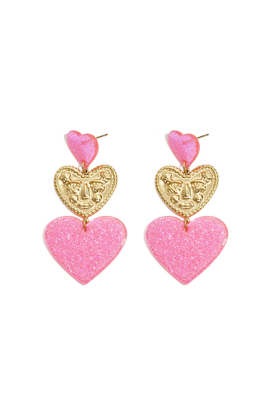 Statement earrings with glitter hearts