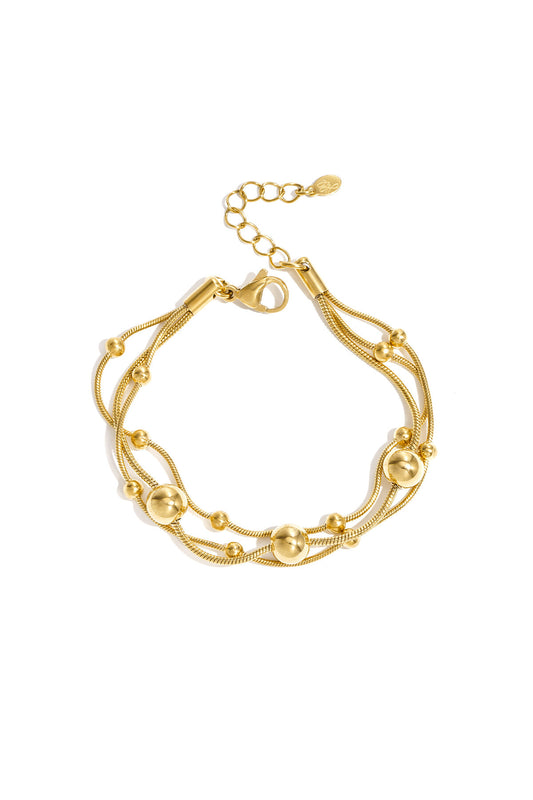 Bracelet with chains and polka dots