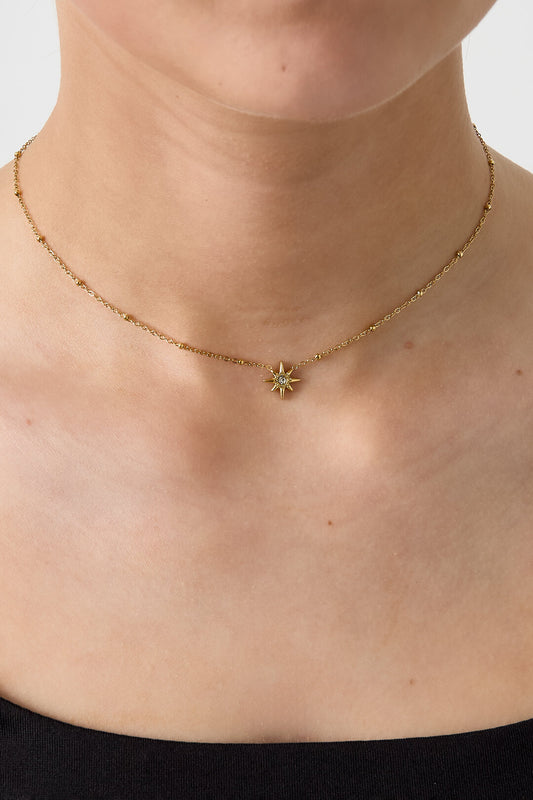 Necklace with beads and shooting star